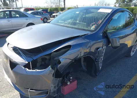 2023 Tesla Model Y Awd/Long Range Dual Motor All-Wheel Drive z USA, uszkodzony, nr VIN 7SAYGDEE7PF905148